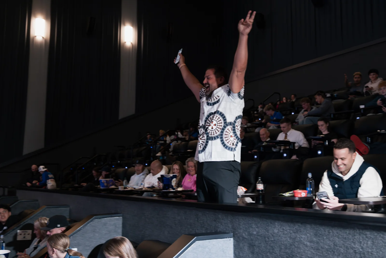 A prize winner celebrating at the Standout premiere